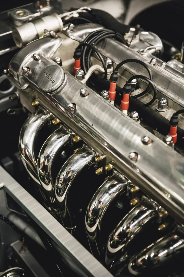 Close-up of a stainless steel diesel engine with exhaust manifolds